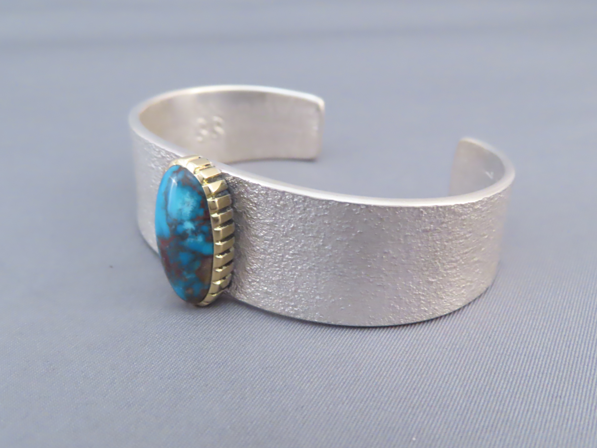 Sandcast Bisbee Turquoise Bracelet with Silver & Gold