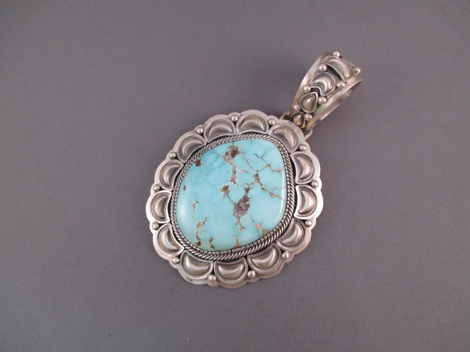 Crow Springs Turquoise & Sterling Silver Pendant by Navajo jewelry artist, Ray Bennett