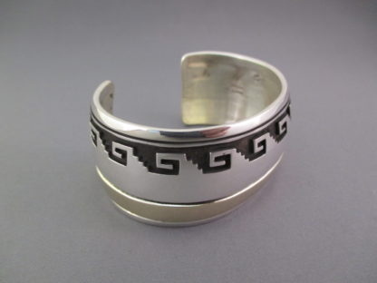 Sterling Silver & 14 kt Gold Cuff Bracelet by Herbert Begaye