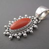 Coral Pendant in Sterling Silver by Artie Yellowhorse
