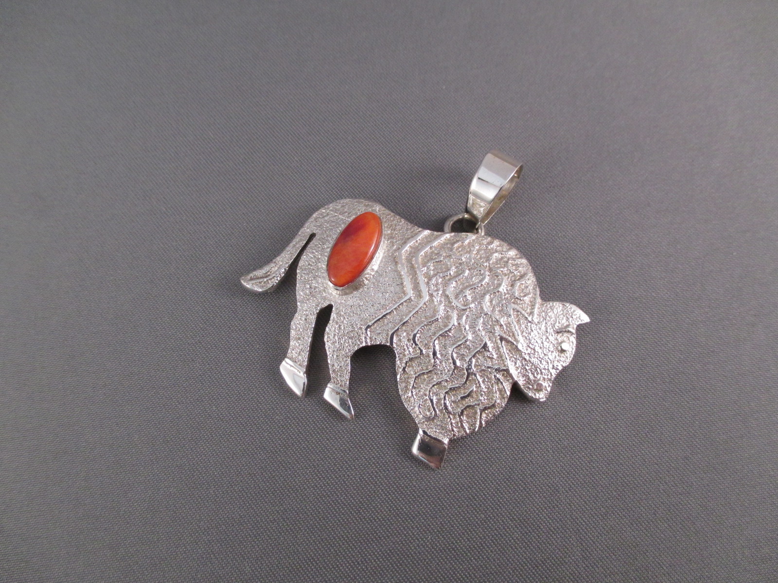 Sterling Silver 'Bison' Pendant with Spiny Oyster Shell by Navajo jewelry artist, Jack Tom $225-