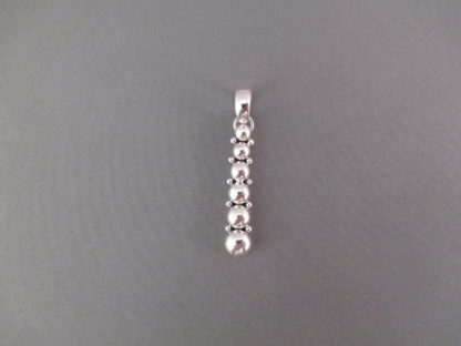 Straight Sterling Silver Pendant with ‘Dots’ by Artie Yellowhorse