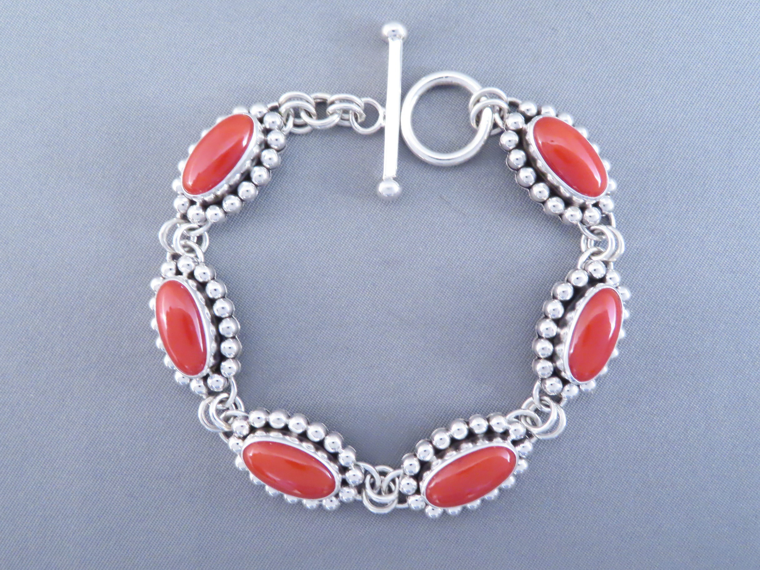 Coral Link Bracelet by Artie Yellowhorse