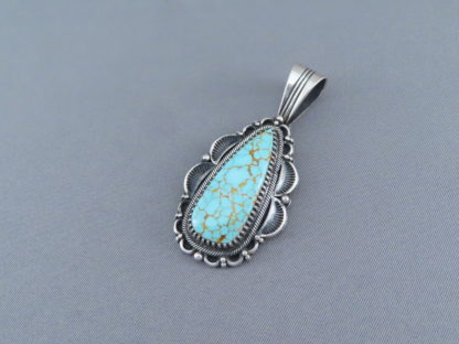 #8 Turquoise Pendant by Delbert Gordon