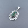 Blue Gem Turquoise Pendant by Leonard Nez