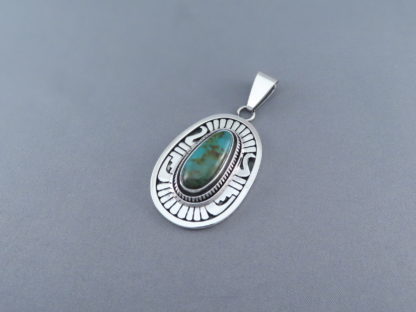 Blue Gem Turquoise Pendant by Leonard Nez