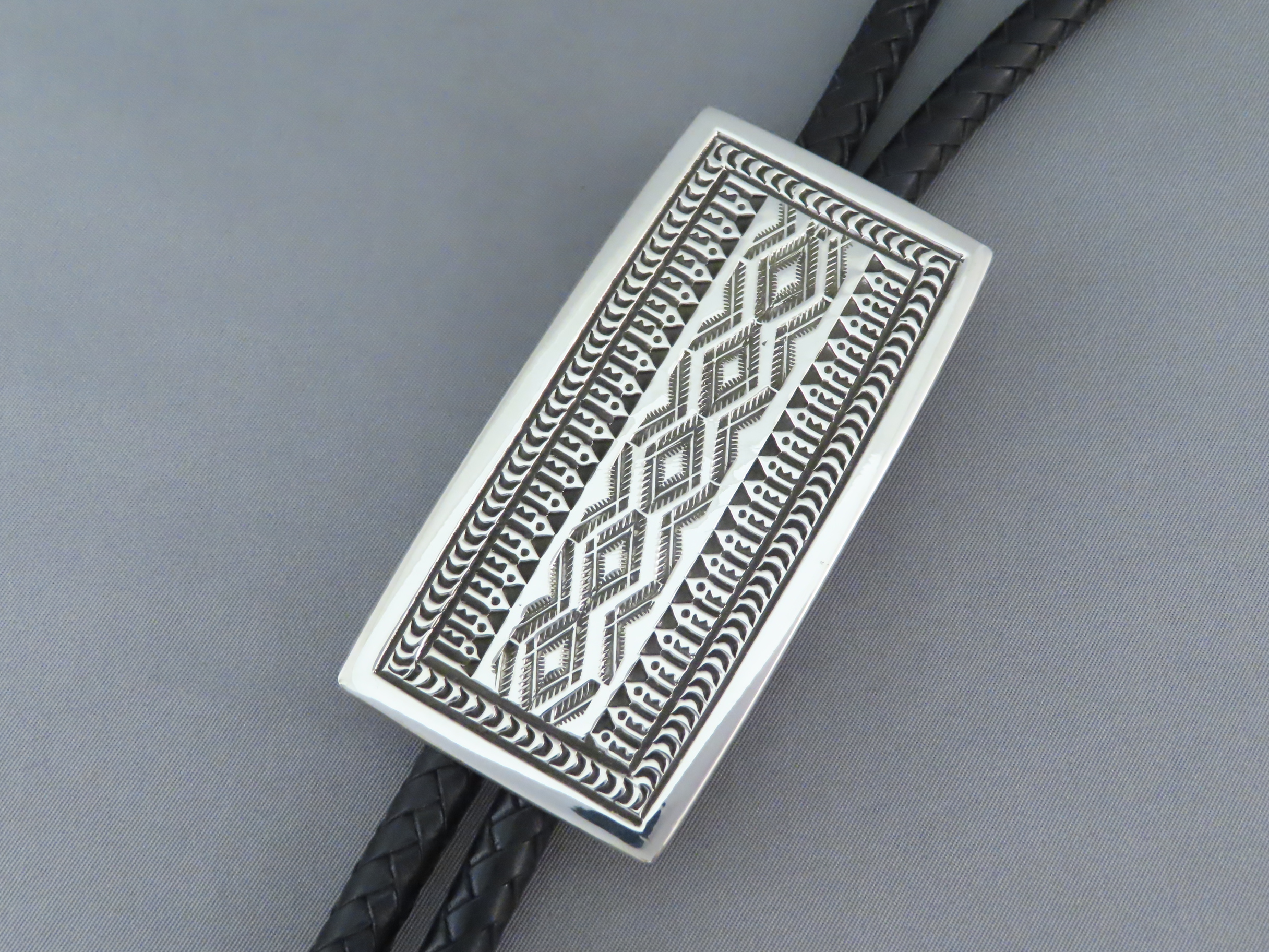 Bolo Tie of Sterling Silver by Lyle Secatero