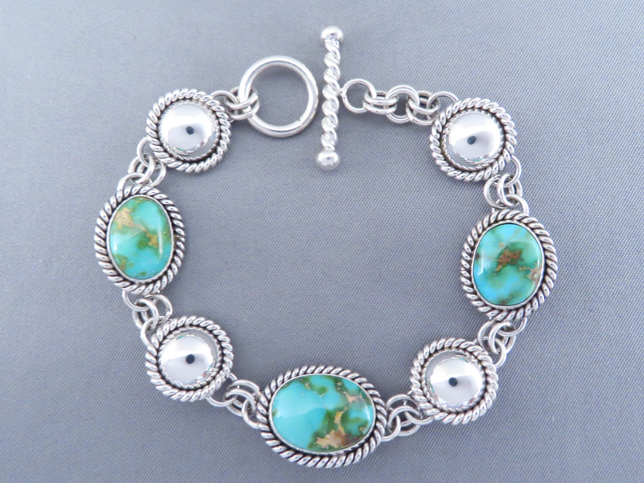 Turquoise Link Bracelet by Artie Yellowhorse (Sonoran Gold)