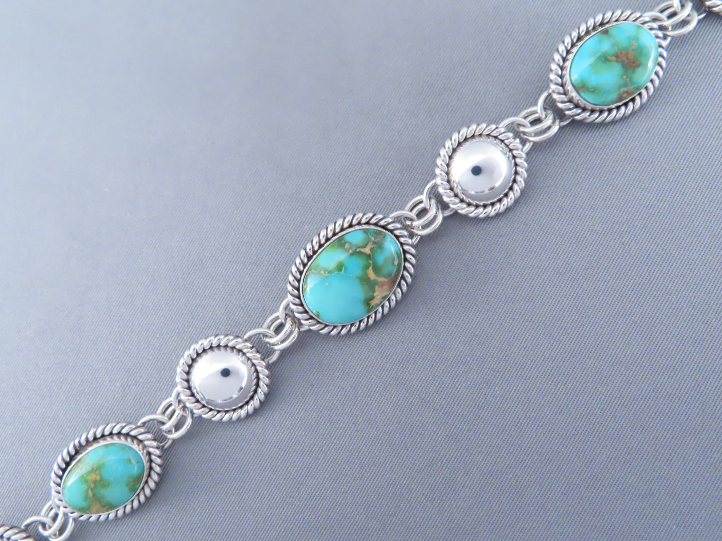 Turquoise Link Bracelet by Artie Yellowhorse (Sonoran Gold)