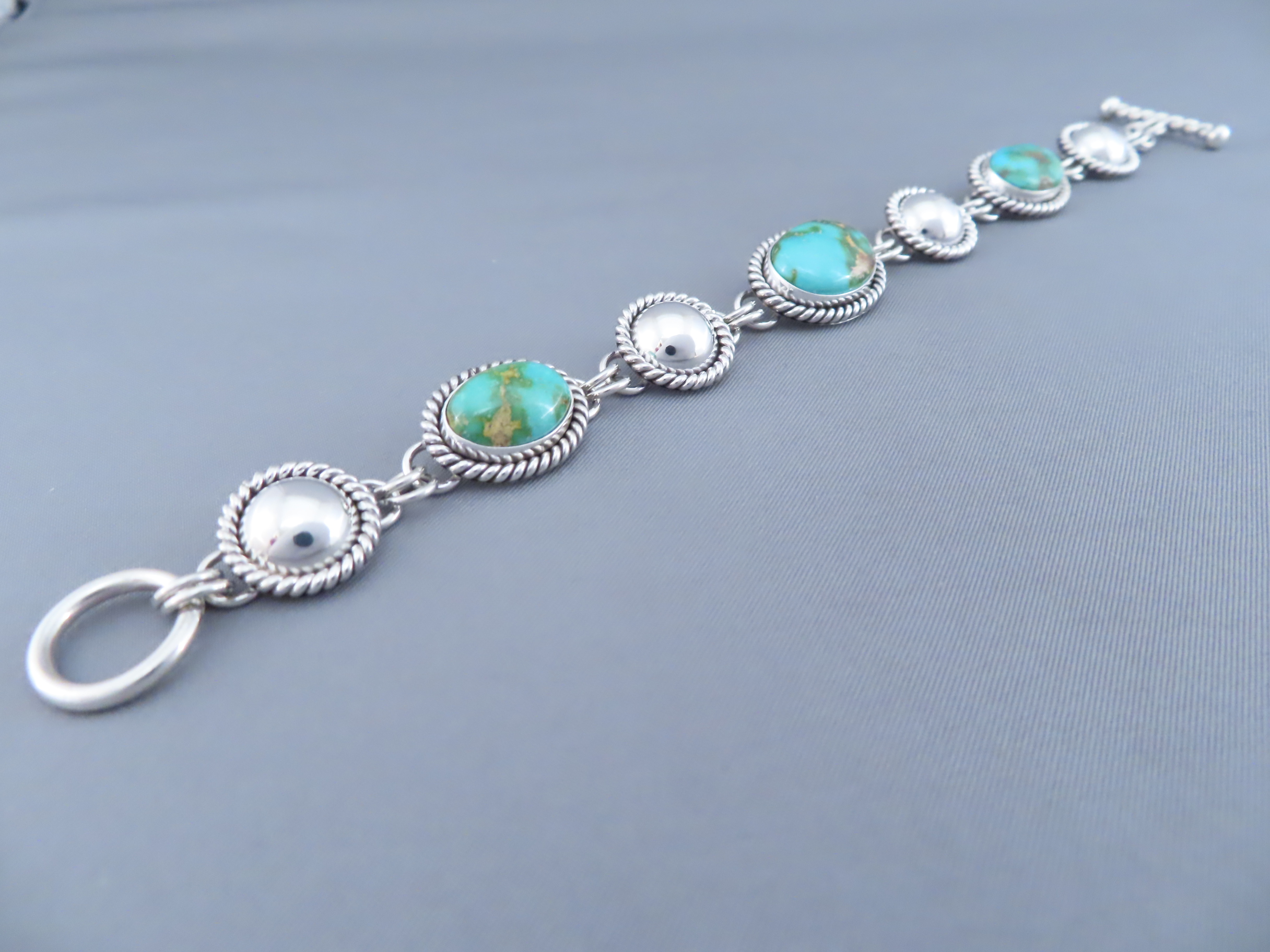 Turquoise Link Bracelet by Artie Yellowhorse (Sonoran Gold)