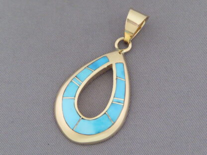 Gold Pendant with Turquoise Inlay