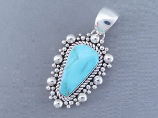 Stormy Mountain Turquoise Pendant by Artie Yellowhorse