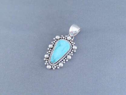 Stormy Mountain Turquoise Pendant by Artie Yellowhorse