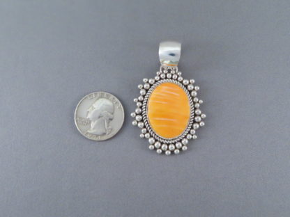 Orange Spiny Oyster Shell Pendant by Artie Yellowhorse