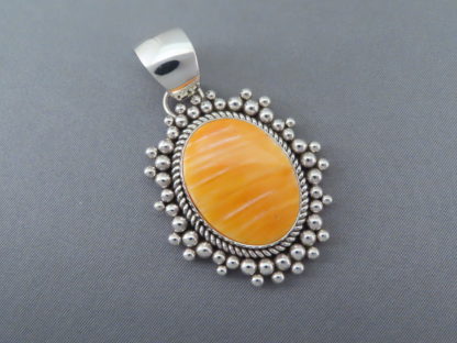 Orange Spiny Oyster Shell Pendant by Artie Yellowhorse