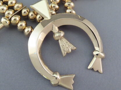 Gold Squash Blossom Necklace by Harrison Jim