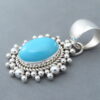 Sleeping Beauty Turquoise Pendant by Artie Yellowhorse