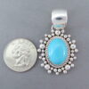 Sleeping Beauty Turquoise Pendant by Artie Yellowhorse