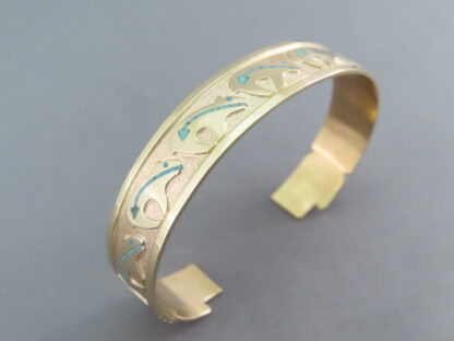 Gold Bracelet with Bears by Robert Taylor