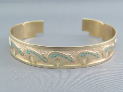 Gold Bracelet with Bears by Robert Taylor
