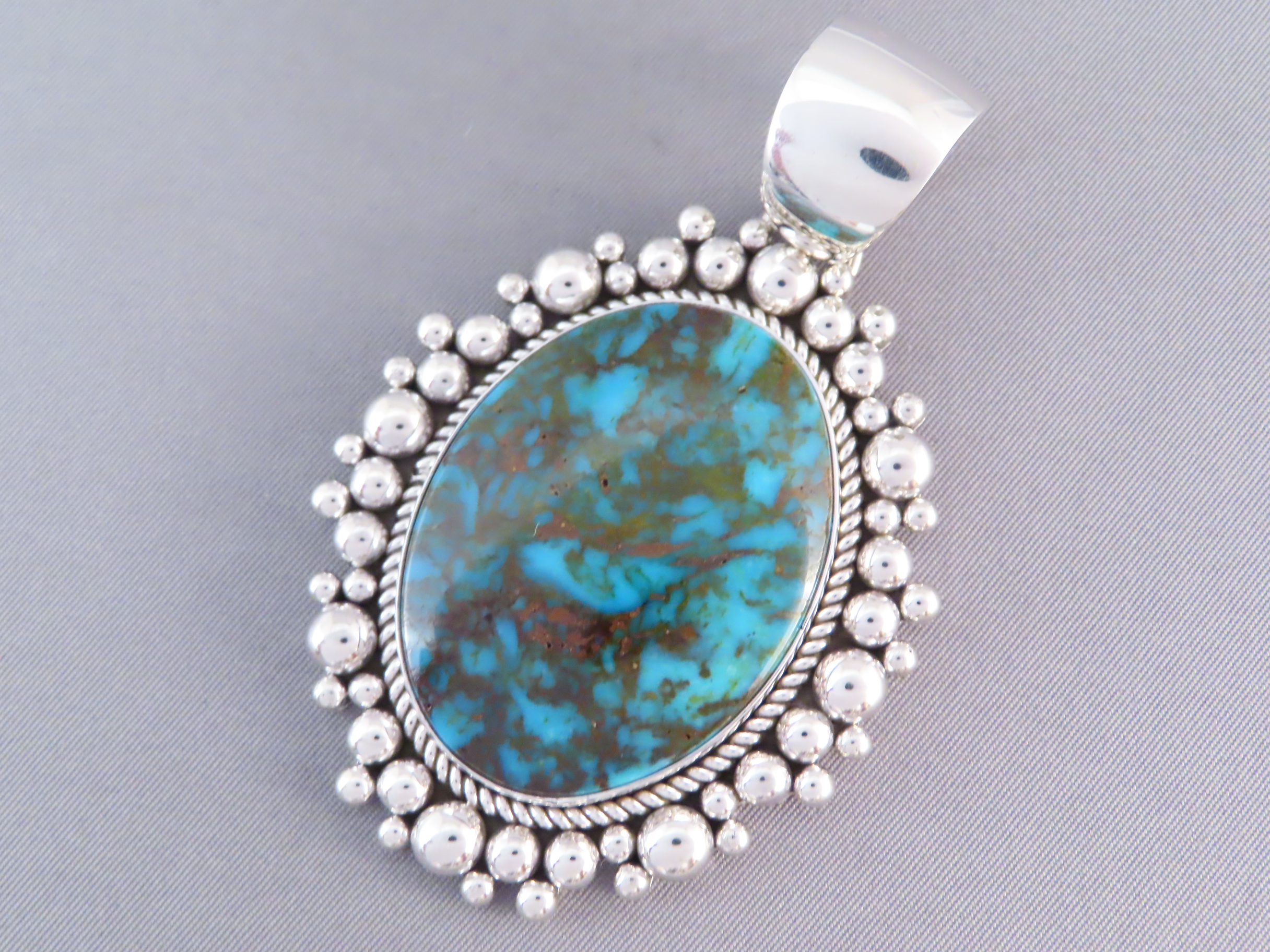 Sterling Silver & Kingman Turquoise Pendant by Artie Yellowhorse
