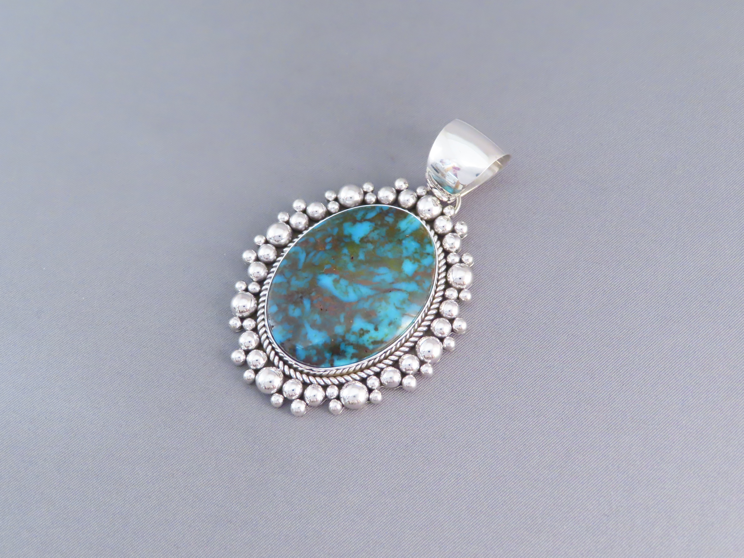 Sterling Silver & Kingman Turquoise Pendant by Artie Yellowhorse