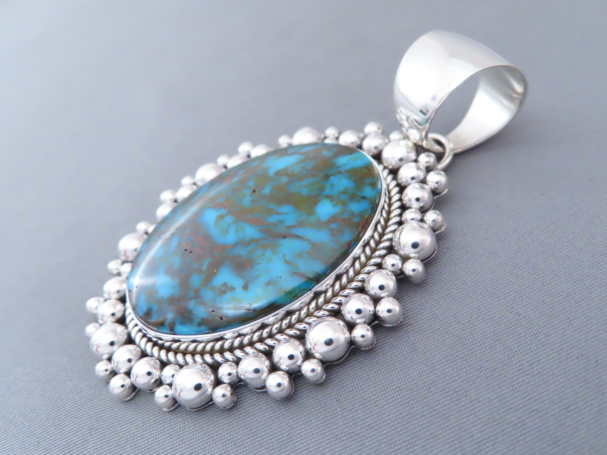 Sterling Silver & Kingman Turquoise Pendant by Artie Yellowhorse