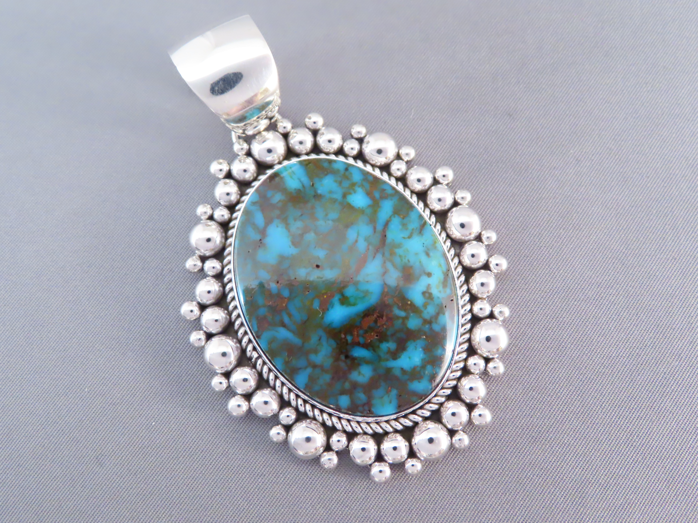 Sterling Silver & Kingman Turquoise Pendant by Artie Yellowhorse