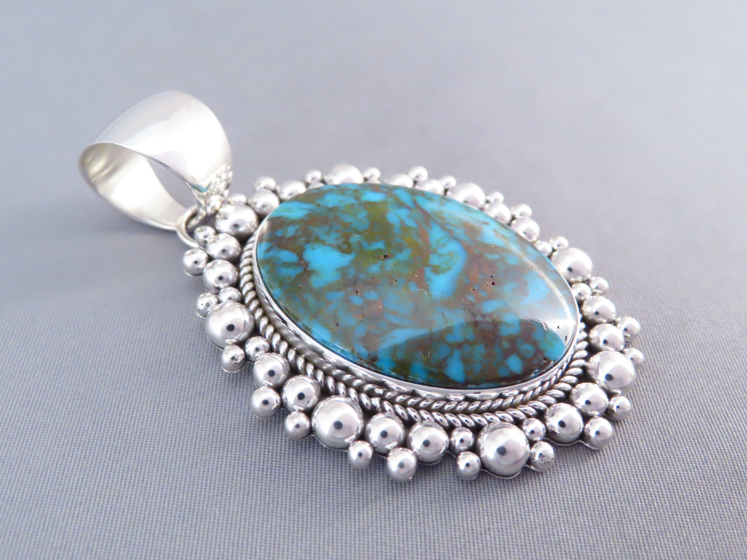 Sterling Silver & Kingman Turquoise Pendant by Artie Yellowhorse