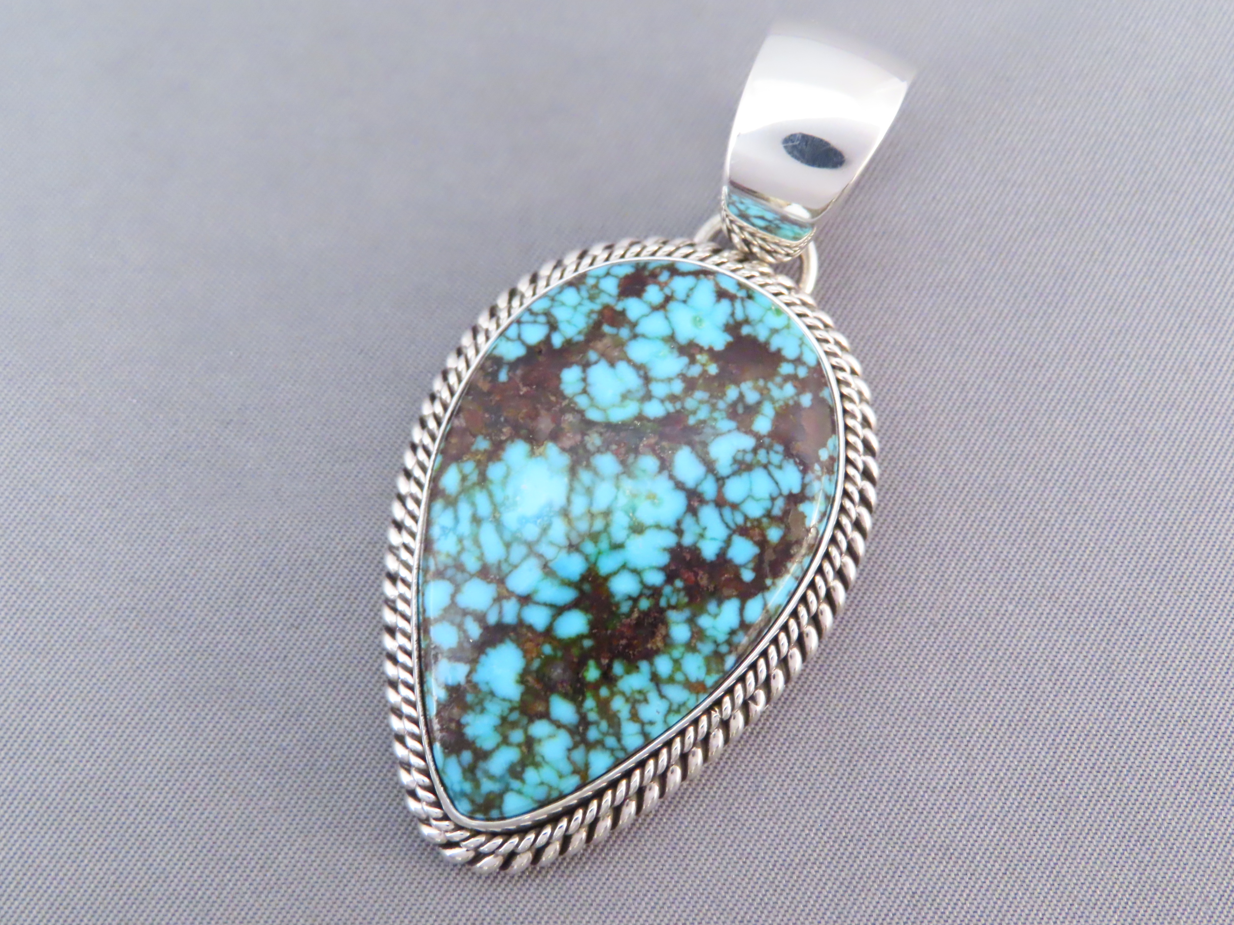 Kingman Turquoise Pendant by Artie Yellowhorse (Navajo)