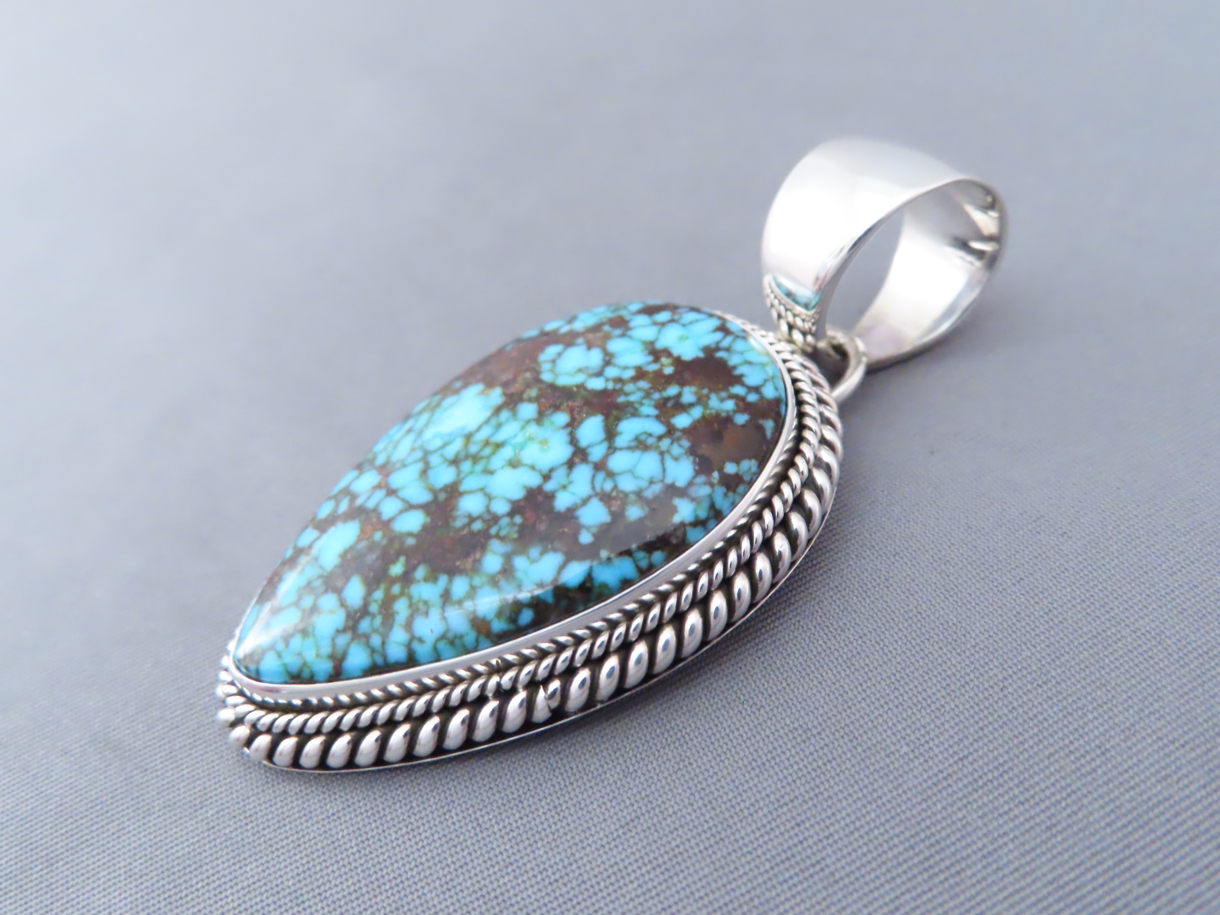 Kingman Turquoise Pendant by Artie Yellowhorse (Navajo)