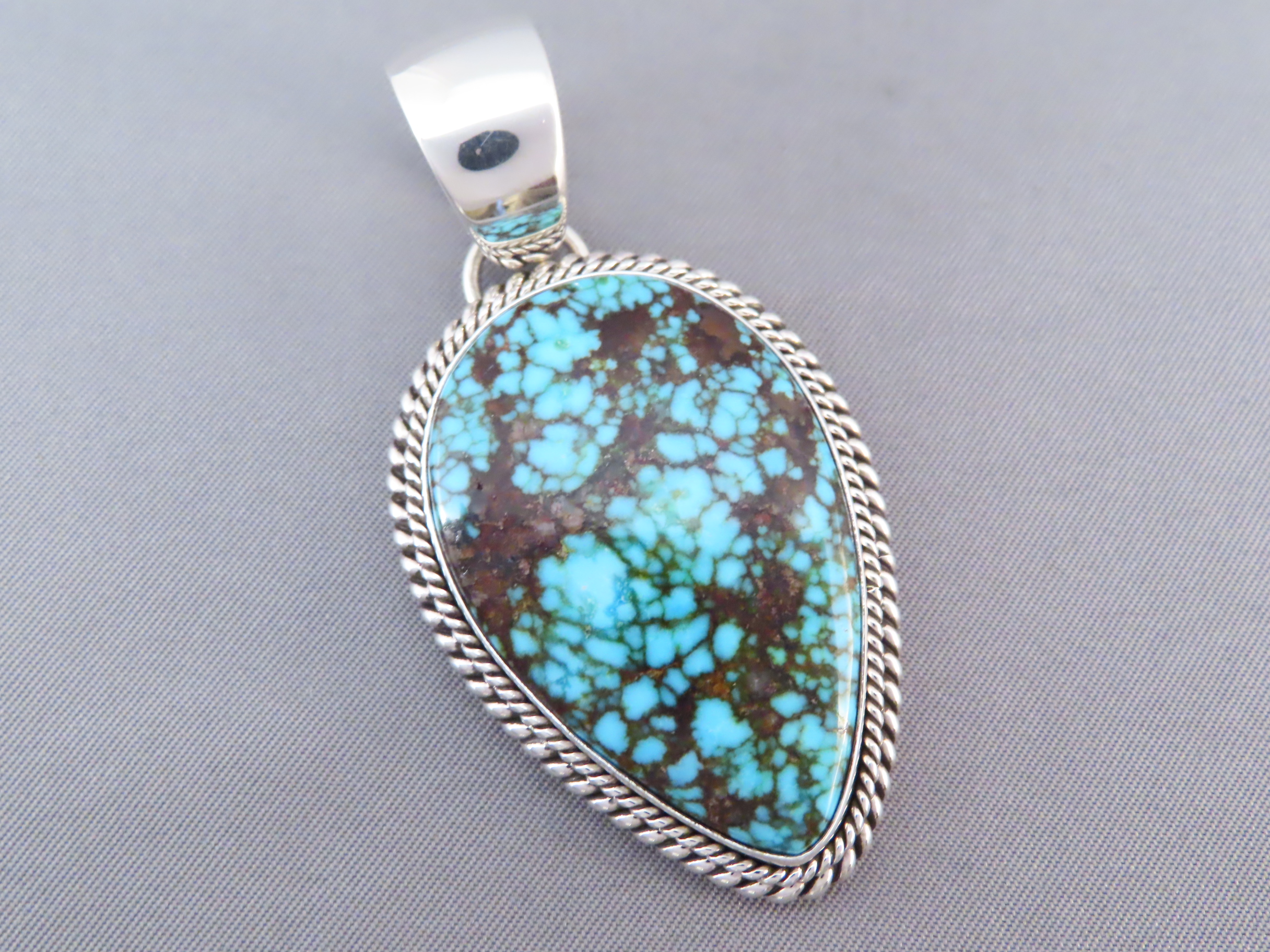 Kingman Turquoise Pendant by Artie Yellowhorse (Navajo)
