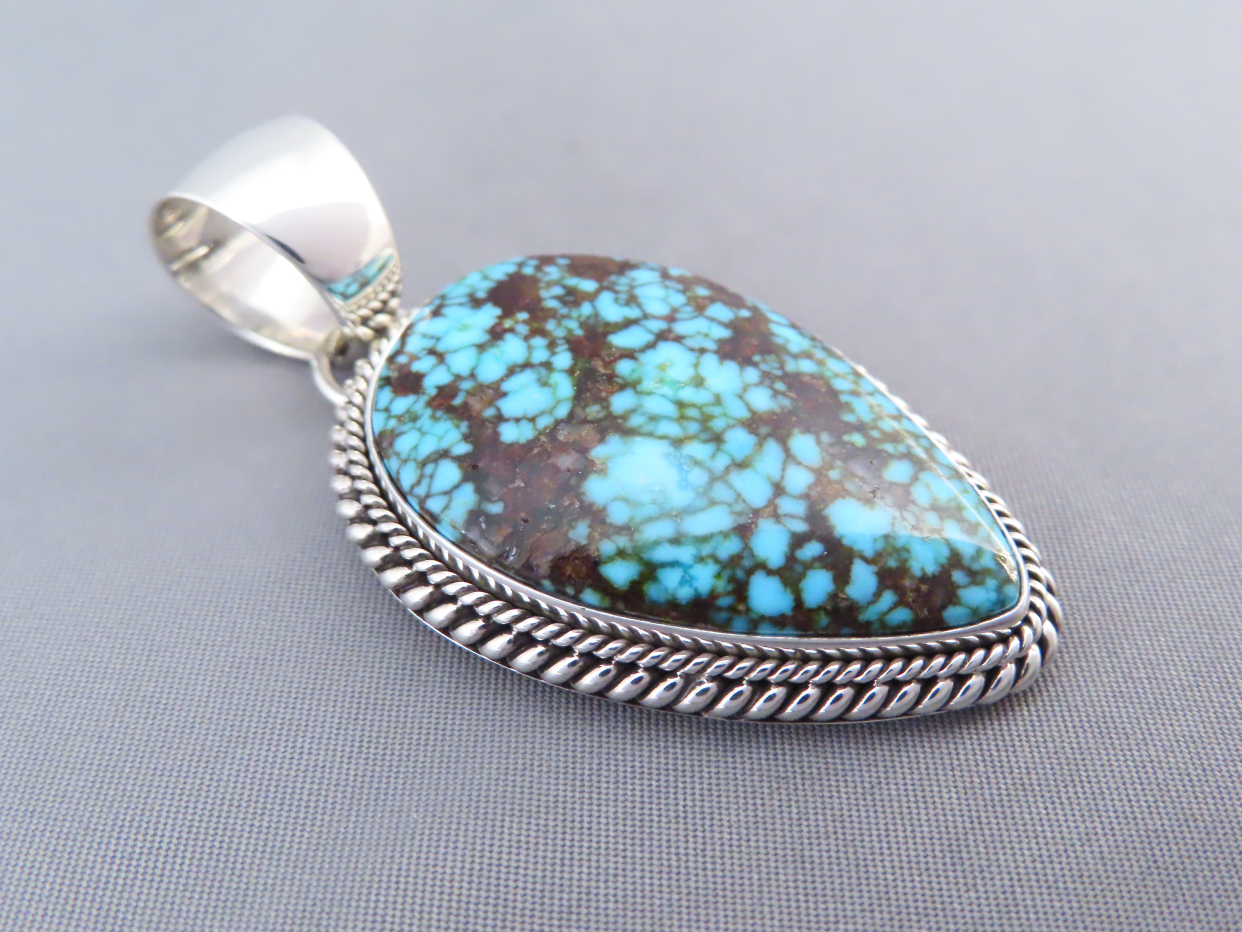 Kingman Turquoise Pendant by Artie Yellowhorse (Navajo)