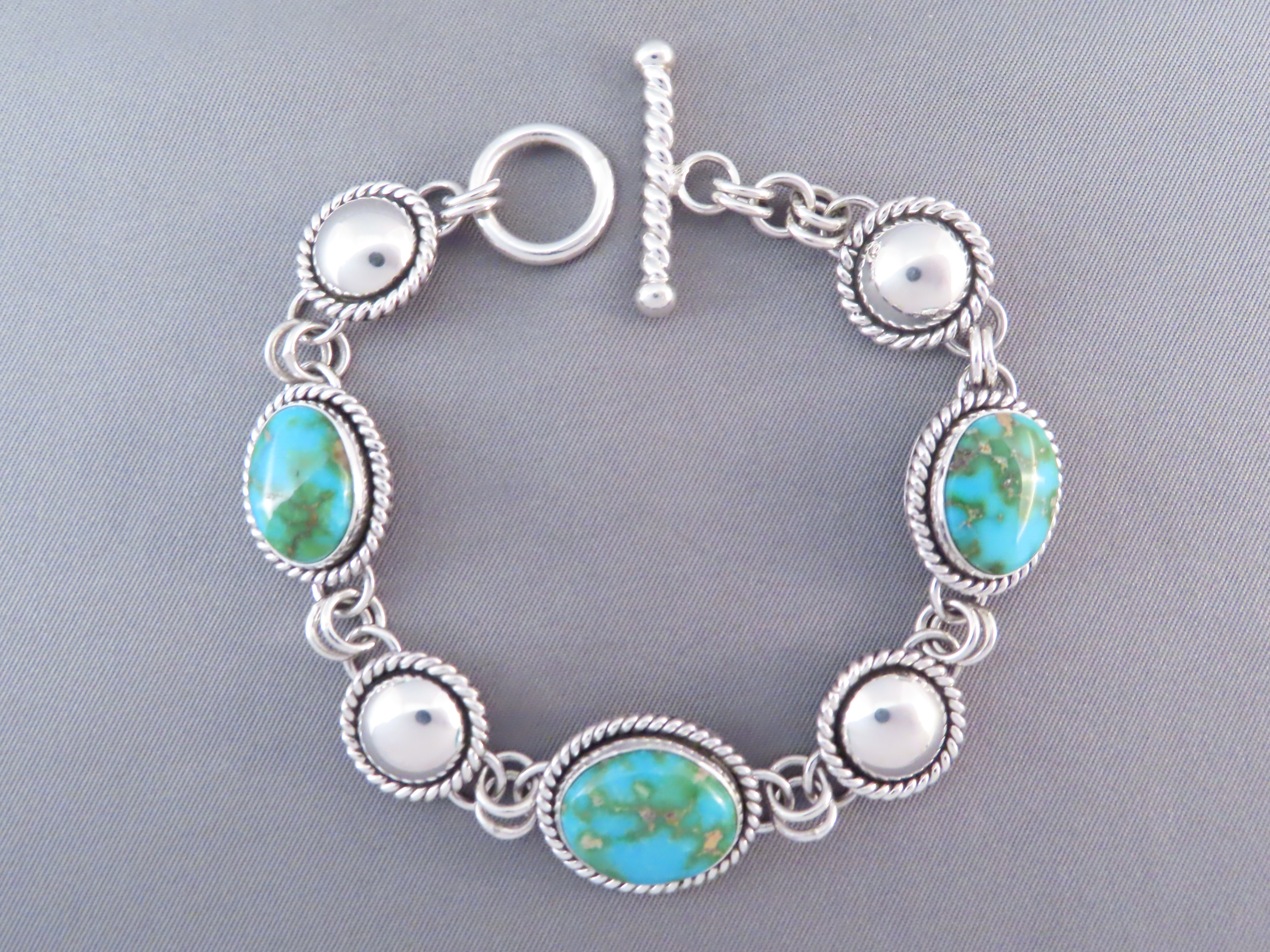 Turquoise Link Bracelet by Artie Yellowhorse (Sonoran Gold)