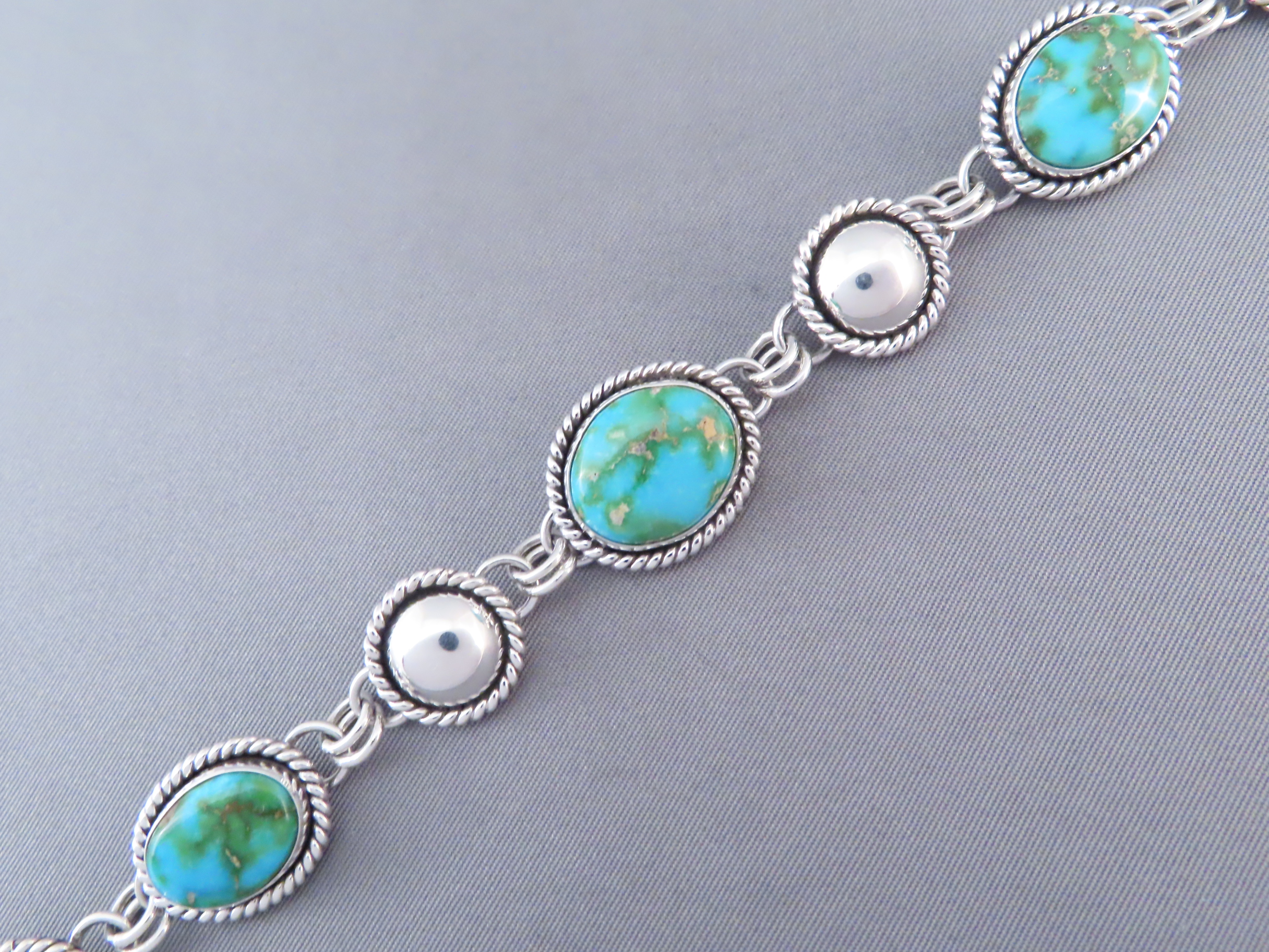 Turquoise Link Bracelet by Artie Yellowhorse (Sonoran Gold)