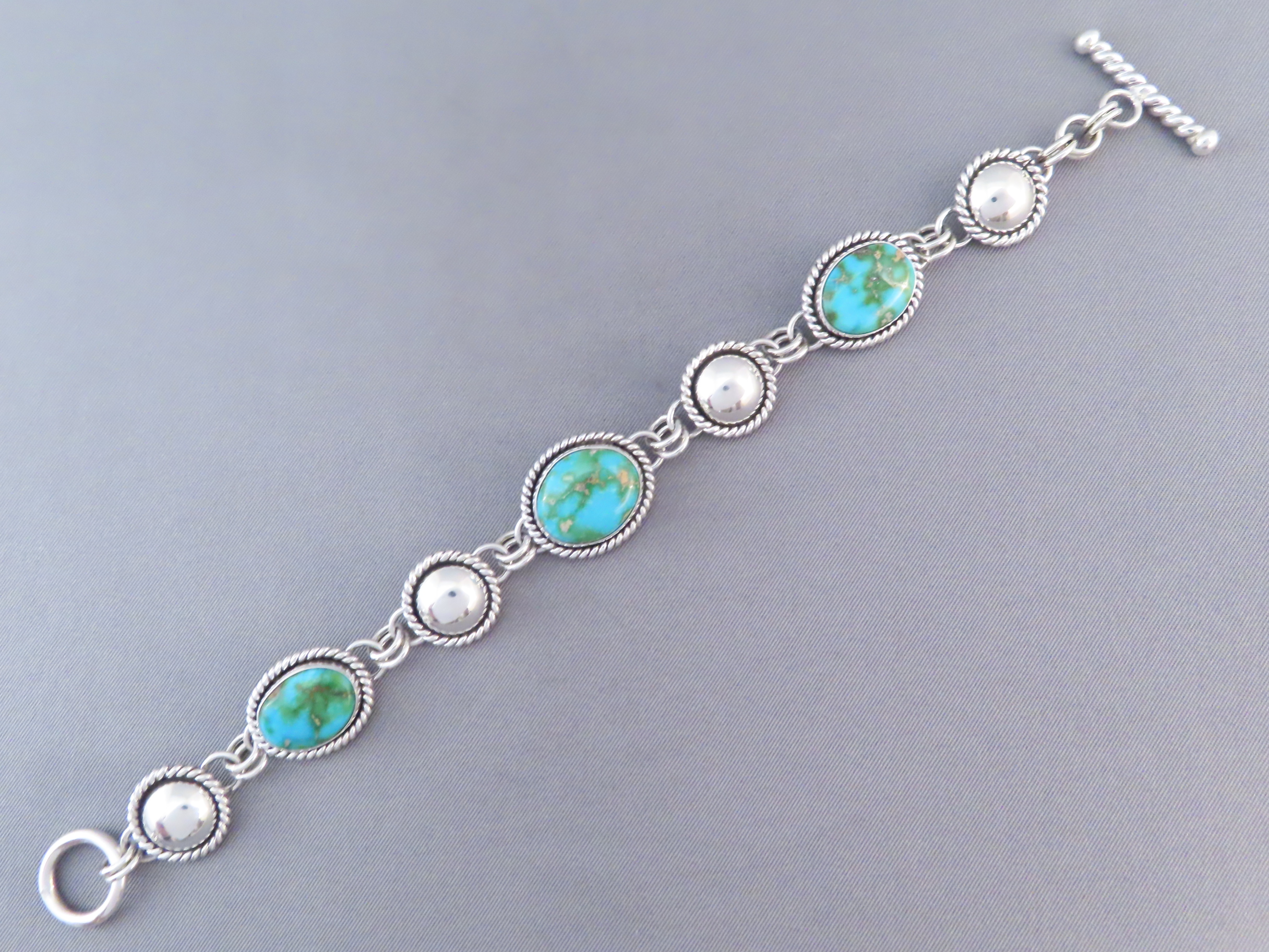 Turquoise Link Bracelet by Artie Yellowhorse (Sonoran Gold)