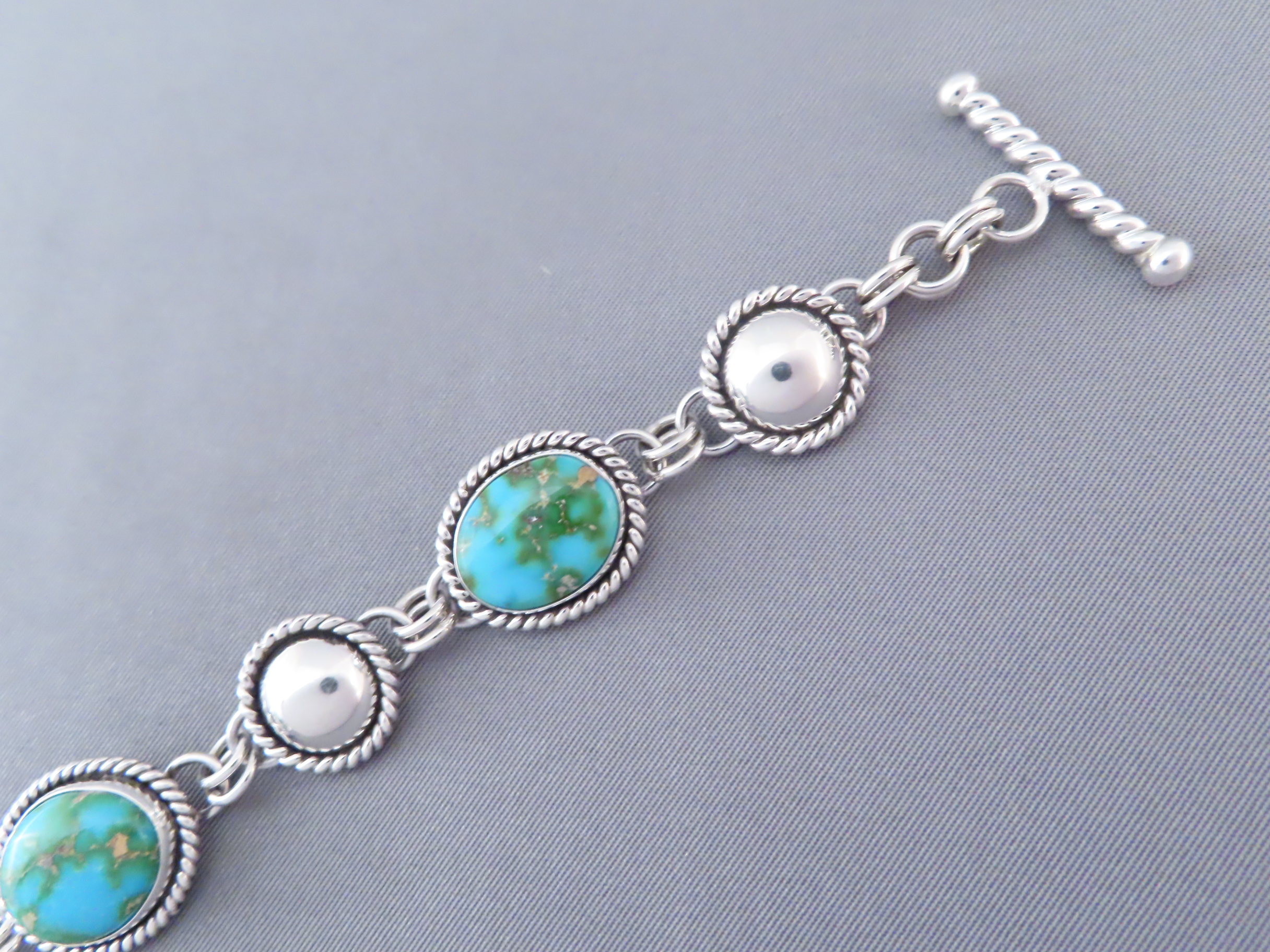 Turquoise Link Bracelet by Artie Yellowhorse (Sonoran Gold)