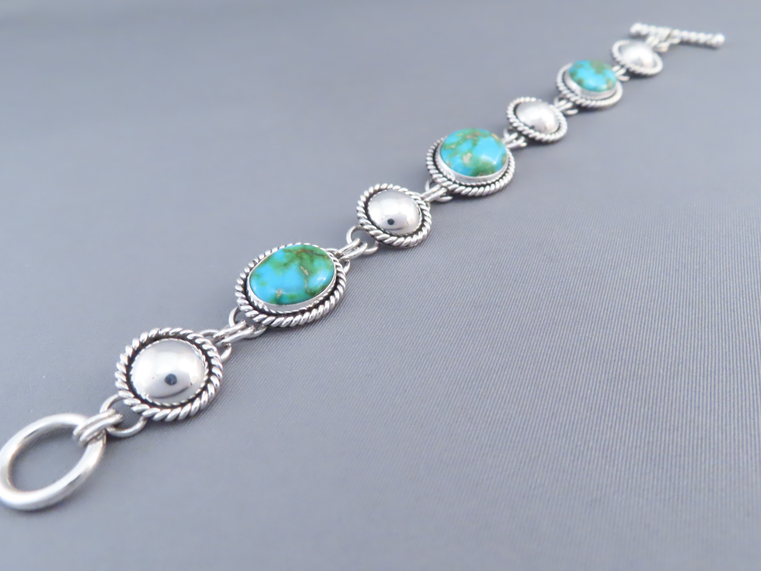 Turquoise Link Bracelet by Artie Yellowhorse (Sonoran Gold)