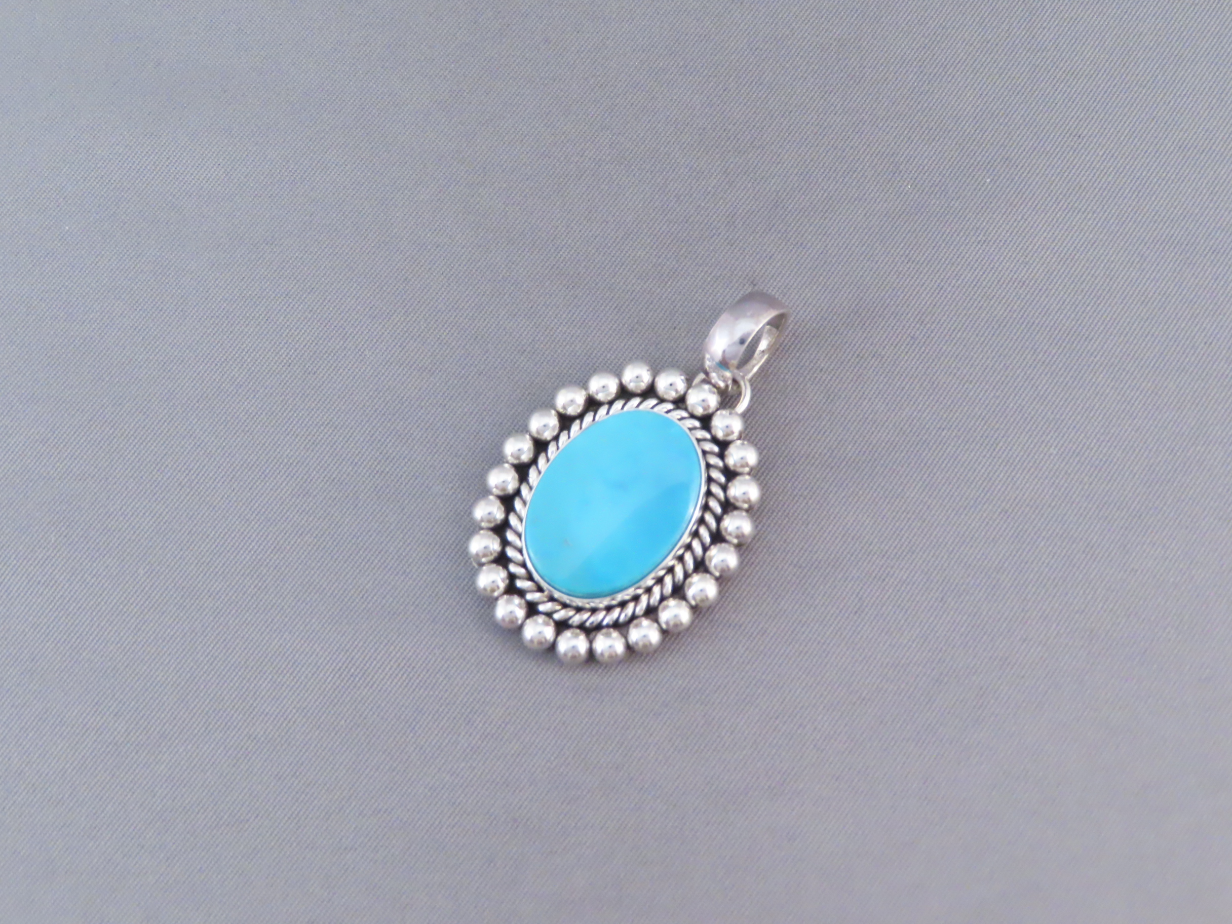 Smaller Turquoise Pendant by Artie Yellowhorse (Kingman)