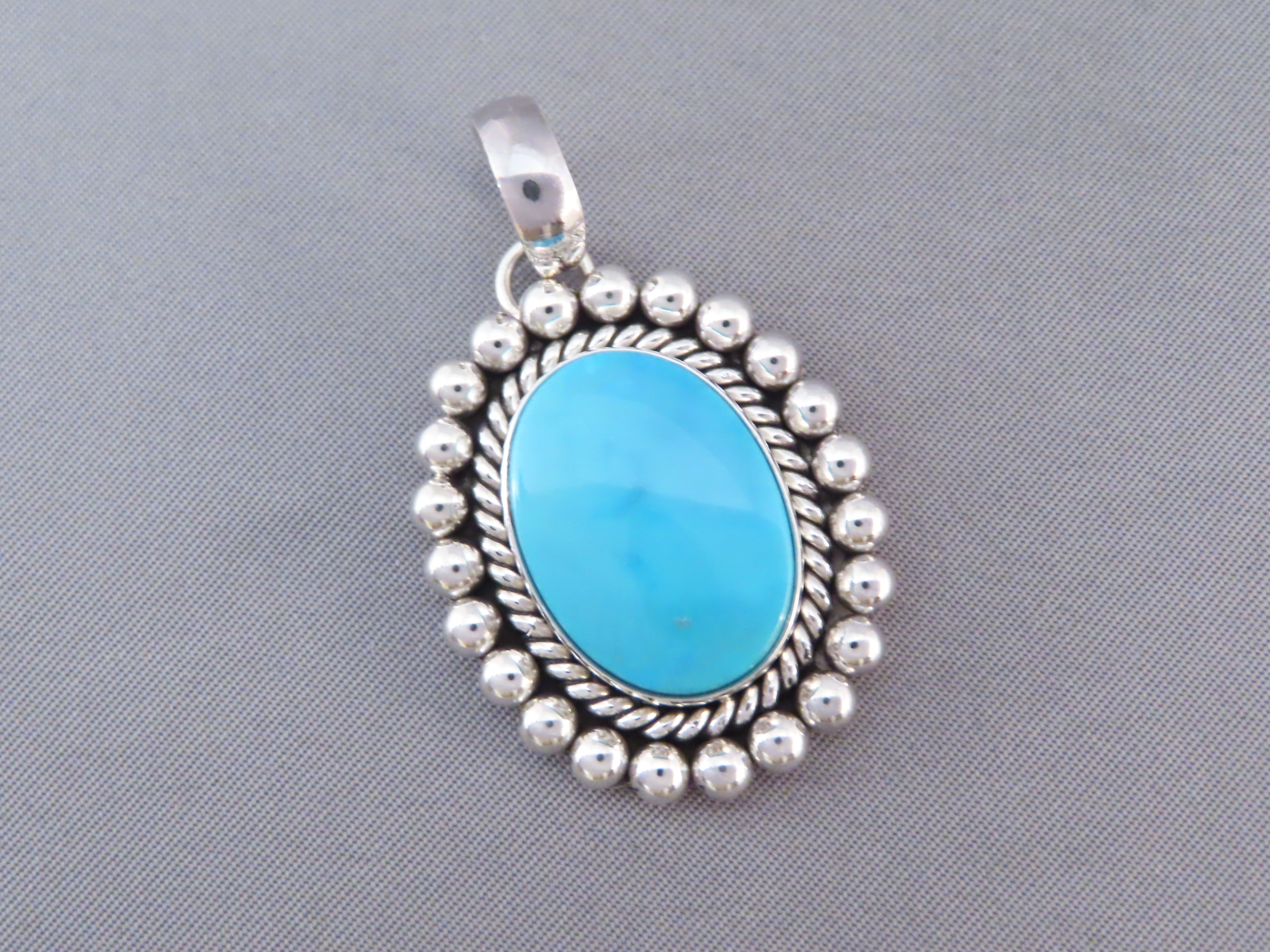 Smaller Turquoise Pendant by Artie Yellowhorse (Kingman)