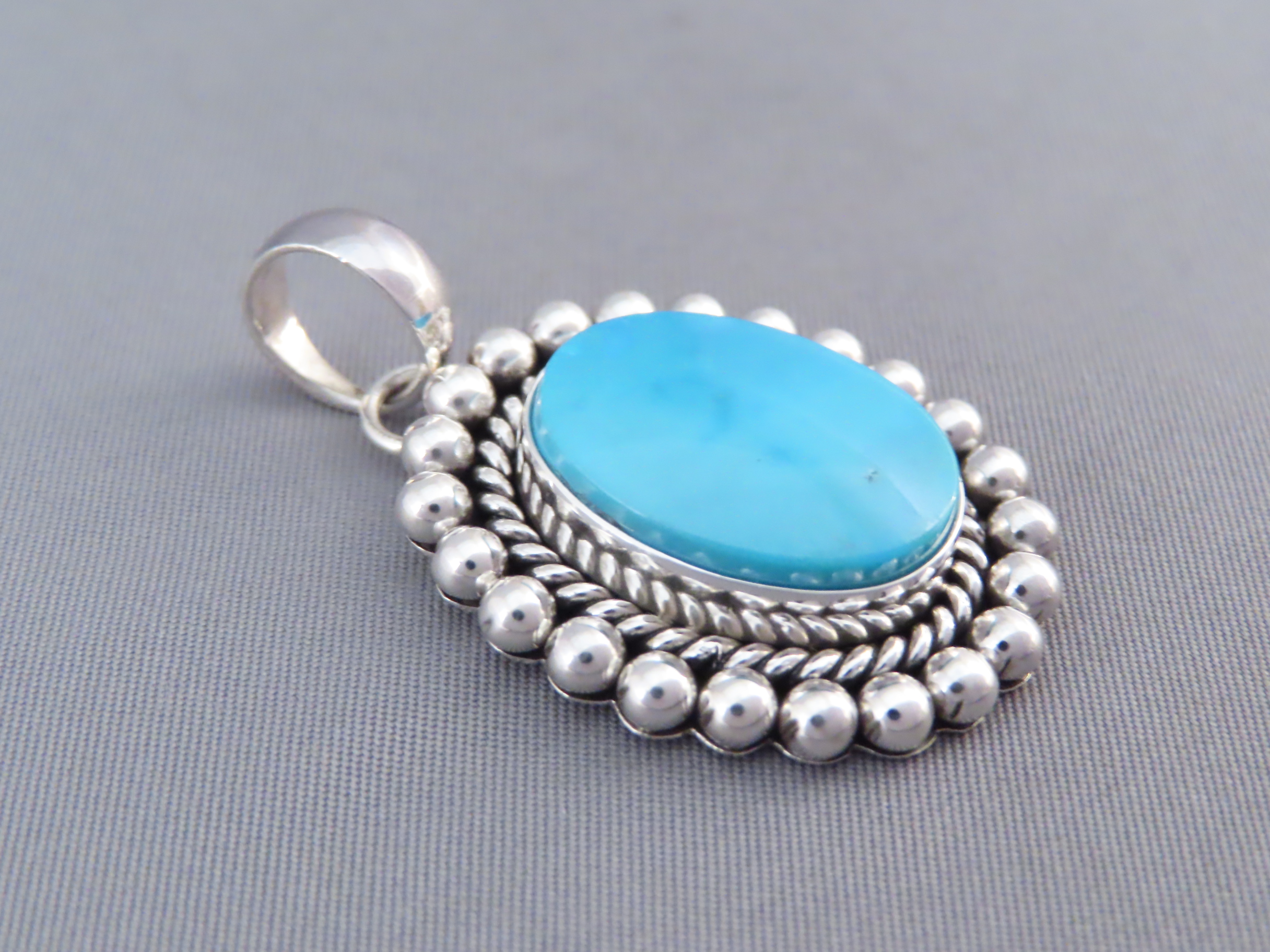 Smaller Turquoise Pendant by Artie Yellowhorse (Kingman)